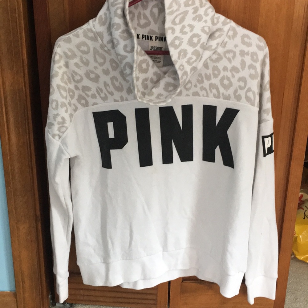 a white Pink cowl neck sweatshirt